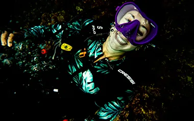 Diver over the reef at Viking Cave